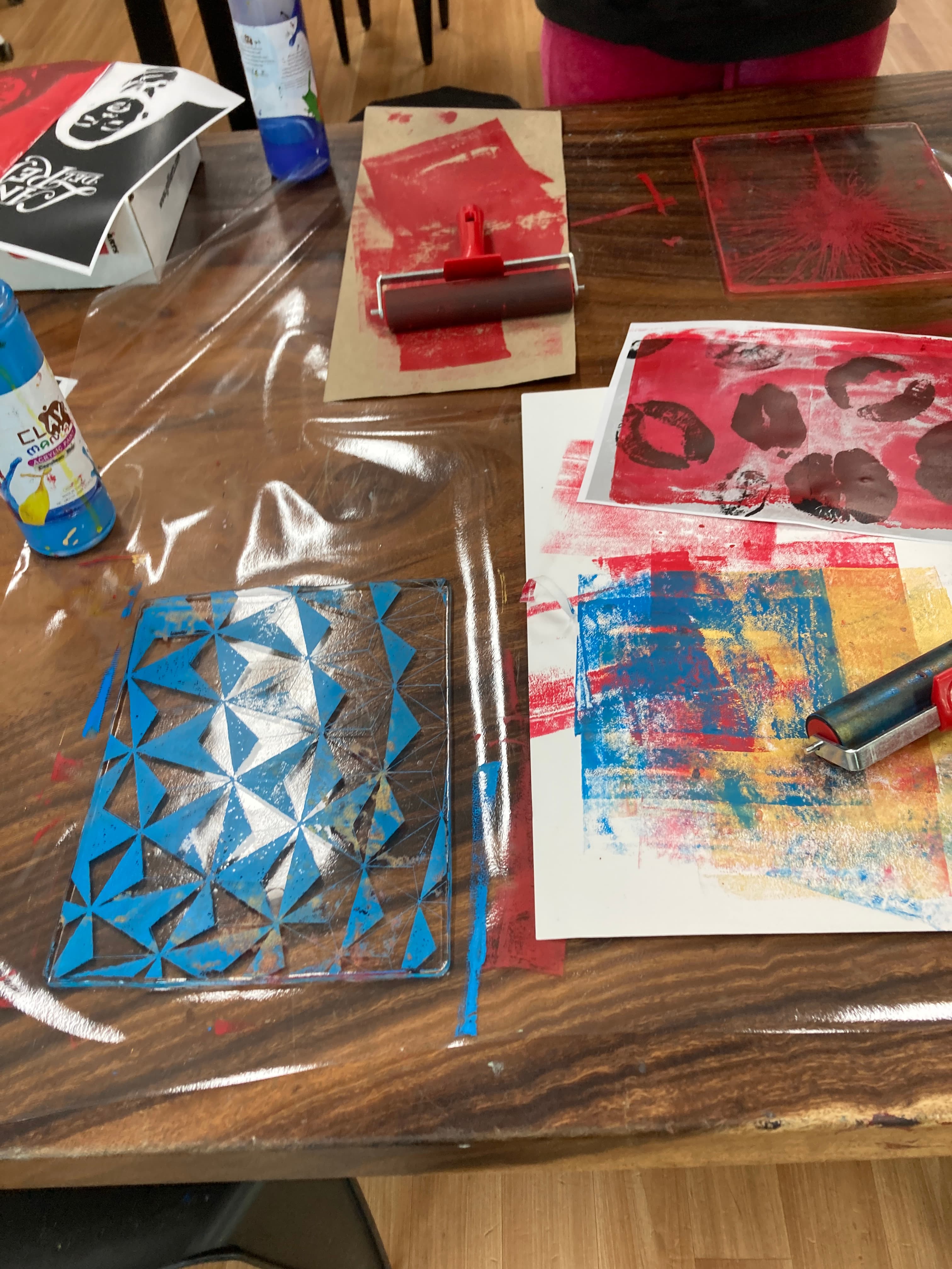 Blue geometric print and rollers on table